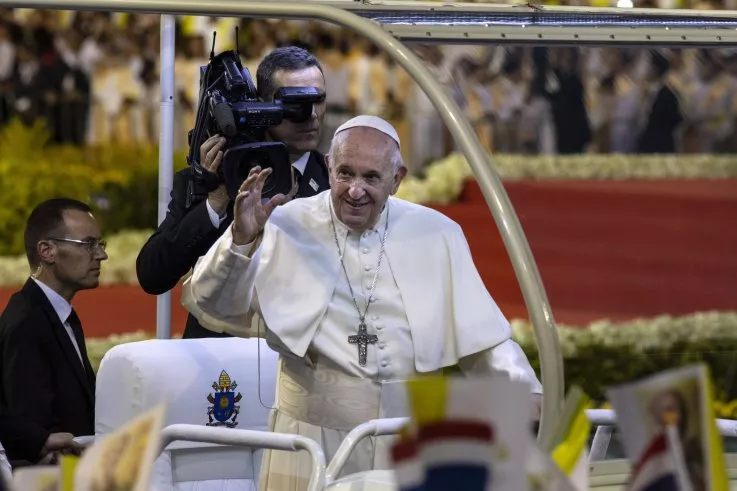 Pope Francis waves to the crowd during mass at The National Stadium of Thailand on November 21, 2019 in Bangkok, Thailand. Pope Francis arrived in Bangkok yesterday to begin a three day tour in Thailand followed by Japan..jpg